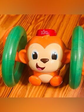 Bright Starts Roll & Glow Monkey - Sounds Lights And Music Interactive Baby Toy